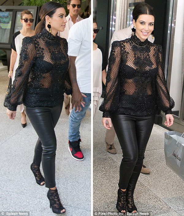 Kim Kardashian Wearing Black Leather Jeans and Lace Outfit with Hot Impressions