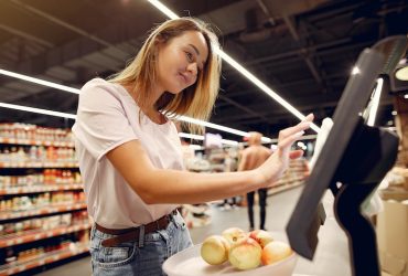 a women is using tablet in retailstore